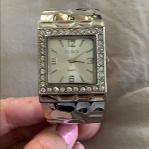 Silver cuff style watch